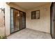 Charming patio with sliding glass doors, offering a seamless indoor-outdoor living experience at 3119 W Cochise Dr # 111, Phoenix, AZ 85051