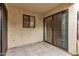 Cozy patio with sliding glass doors, perfect for relaxing at 3119 W Cochise Dr # 111, Phoenix, AZ 85051