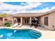 Stunning backyard pool and patio area, perfect for outdoor entertaining and relaxation at 3519 E Bridgeport Pkwy, Gilbert, AZ 85295