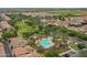 Aerial view showcasing the community's pool, green spaces, and meticulously planned residential layout at 3687 E Leslie Dr, Gilbert, AZ 85296