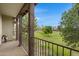 Balcony with decorative iron railings and views of the neighborhood green space at 3687 E Leslie Dr, Gilbert, AZ 85296
