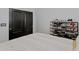 Bedroom featuring a cozy bed and ample shoe storage, complete with a sliding closet door at 3687 E Leslie Dr, Gilbert, AZ 85296