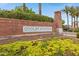 Brick sign with lush landscaping marks the entrance to Cooley Station, an inviting community at 3687 E Leslie Dr, Gilbert, AZ 85296