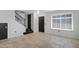 Open entryway with tile floors, a staircase, and natural light from window with blinds at 3687 E Leslie Dr, Gilbert, AZ 85296