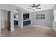 Bright living room with light wood floors, neutral walls, and open access to the modern kitchen at 3687 E Leslie Dr, Gilbert, AZ 85296