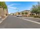 Well-maintained street showcasing multiple three-story buildings and convenient parking spots at 3687 E Leslie Dr, Gilbert, AZ 85296