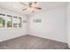 Bright bedroom with natural light and tiled floor at 3710 E Mercer Ln, Phoenix, AZ 85028