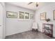 Cozy bedroom with natural light, shuttered window, and artwork. A peaceful retreat at 3710 E Mercer Ln, Phoenix, AZ 85028