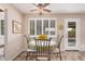 Cozy dining area featuring plantation shutters and a charming round table at 3710 E Mercer Ln, Phoenix, AZ 85028