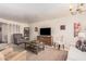 Comfortable living room with lots of seating, stylish decor, and a warm, neutral palette at 3710 E Mercer Ln, Phoenix, AZ 85028