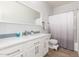 Bathroom featuring tile floors, white cabinets and shower with a light-grey shower curtain at 3830 E Lakewood Pkwy # 3099, Phoenix, AZ 85048
