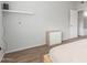 Neutral bedroom with wood floors, a three drawer dresser and lots of natural light at 3830 E Lakewood Pkwy # 3099, Phoenix, AZ 85048