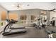 Well-equipped gym featuring treadmills, elliptical machines, and various weight-training equipment for a complete workout at 3830 E Lakewood Pkwy # 3099, Phoenix, AZ 85048