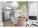 Open-concept kitchen with stainless steel appliances, quartz countertops, and blue tiled backsplash at 3830 E Lakewood Pkwy # 3099, Phoenix, AZ 85048