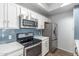Bright and clean kitchen with modern appliances and sleek white cabinets at 3830 E Lakewood Pkwy # 3099, Phoenix, AZ 85048