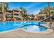 Resort-style pool and spa area with ample lounge seating, offering a luxurious outdoor experience for residents at 3830 E Lakewood Pkwy # 3099, Phoenix, AZ 85048