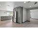 Recently remodeled open-concept kitchen with modern appliances and gray cabinets, enhancing functionality and style at 3973 W Hearn Rd, Phoenix, AZ 85053