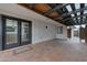 Covered patio with outdoor lighting offering a comfortable outdoor living space and backyard access at 3973 W Hearn Rd, Phoenix, AZ 85053