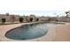 Inviting backyard pool featuring desert landscaping and a secure surrounding wall at 3973 W Hearn Rd, Phoenix, AZ 85053