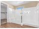 Bright shower with glass door, tiled floors, and convenient walk-in access for a refreshing experience at 42213 W Santa Fe St, Maricopa, AZ 85138