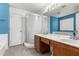 Well-lit bathroom with dual sinks, corner shower, and tiled flooring at 510 W Amoroso Dr, Gilbert, AZ 85233