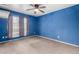 Bedroom with a ceiling fan fixture and window for natural light at 510 W Amoroso Dr, Gilbert, AZ 85233