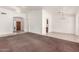 Open living room featuring high ceilings, neutral paint, and arched doorways at 510 W Amoroso Dr, Gilbert, AZ 85233