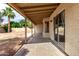 Back patio with a concrete floor, stucco walls, and a view of the backyard and block wall at 510 W Amoroso Dr, Gilbert, AZ 85233