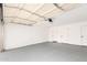 Spacious two-car garage with a sealed concrete floor, ample lighting and multiple doors at 524 S Pioneer --, Mesa, AZ 85204