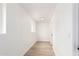 Hallway with a neutral color palette and modern lighting at 524 S Pioneer --, Mesa, AZ 85204