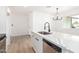 Modern kitchen featuring stainless steel appliances, quartz counters, and contemporary finishes at 524 S Pioneer --, Mesa, AZ 85204