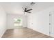 Living room featuring wood floors and sliding doors at 524 S Pioneer --, Mesa, AZ 85204