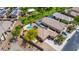 Aerial view of homes with swimming pools, solar panels, and well-maintained landscaping at 5401 S Dove Holw, Buckeye, AZ 85326
