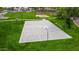 Neighborhood park features a well-maintained basketball court and lush green spaces at 5401 S Dove Holw, Buckeye, AZ 85326