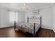 Bedroom featuring hardwood flooring, a ceiling fan, and natural light at 6236 N 16Th St # 1, Phoenix, AZ 85016