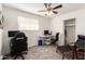 This bedroom features carpet flooring and a ceiling fan for comfort at 6426 W Lamar Rd, Glendale, AZ 85301