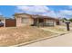 Charming single-story home with a cozy front porch and drought resistant landscaping at 6426 W Lamar Rd, Glendale, AZ 85301