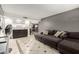 Spacious living room area leading into the open concept kitchen and dining space at 6426 W Lamar Rd, Glendale, AZ 85301