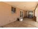 Covered patio featuring neutral tones, offering an ideal space for relaxing and entertaining at 6426 W Lamar Rd, Glendale, AZ 85301