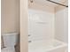 Bright bathroom with a shower-tub combo and updated fixtures offers a clean and functional space at 645 S Esquire Way, Mesa, AZ 85202