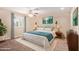 Cozy main bedroom with ceiling fan, large windows and natural light at 645 S Esquire Way, Mesa, AZ 85202