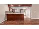 This eat-in kitchen features stainless appliances, granite counters, and ample storage space at 645 S Esquire Way, Mesa, AZ 85202