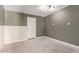 Room with wainscotting details with concrete floors that offer a modern, industrial feel at 645 S Esquire Way, Mesa, AZ 85202