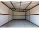 Interior of the metal storage shed with ample space and a sturdy metal frame at 645 S Esquire Way, Mesa, AZ 85202