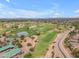 Expansive golf course with a tranquil lake and manicured greens provide a peaceful setting for golfers at 704 E Gemini Pl, Chandler, AZ 85249