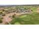 Scenic aerial view of a vibrant golf course featuring lush greens and a clubhouse at 704 E Gemini Pl, Chandler, AZ 85249