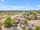 Charming houses in a golf community with landscaped yards and access to community green spaces at 704 E Gemini Pl, Chandler, AZ 85249