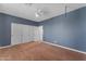Bedroom with carpeted floor and a closet with sliding doors at 704 E Gemini Pl, Chandler, AZ 85249