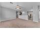 Large bonus room featuring neutral walls, carpet, and an open layout at 704 E Gemini Pl, Chandler, AZ 85249