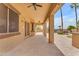 Beautiful covered patio with an outdoor kitchen overlooking the backyard at 704 E Gemini Pl, Chandler, AZ 85249